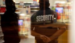 Photo by Flex Point Security man in gray and white crew neck t-shirt