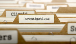 Investigations Concept with Word on Folder.